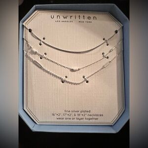 NWT Macy’s Unwritten Finely Silver Plated Necklace Set of three in a gift box.